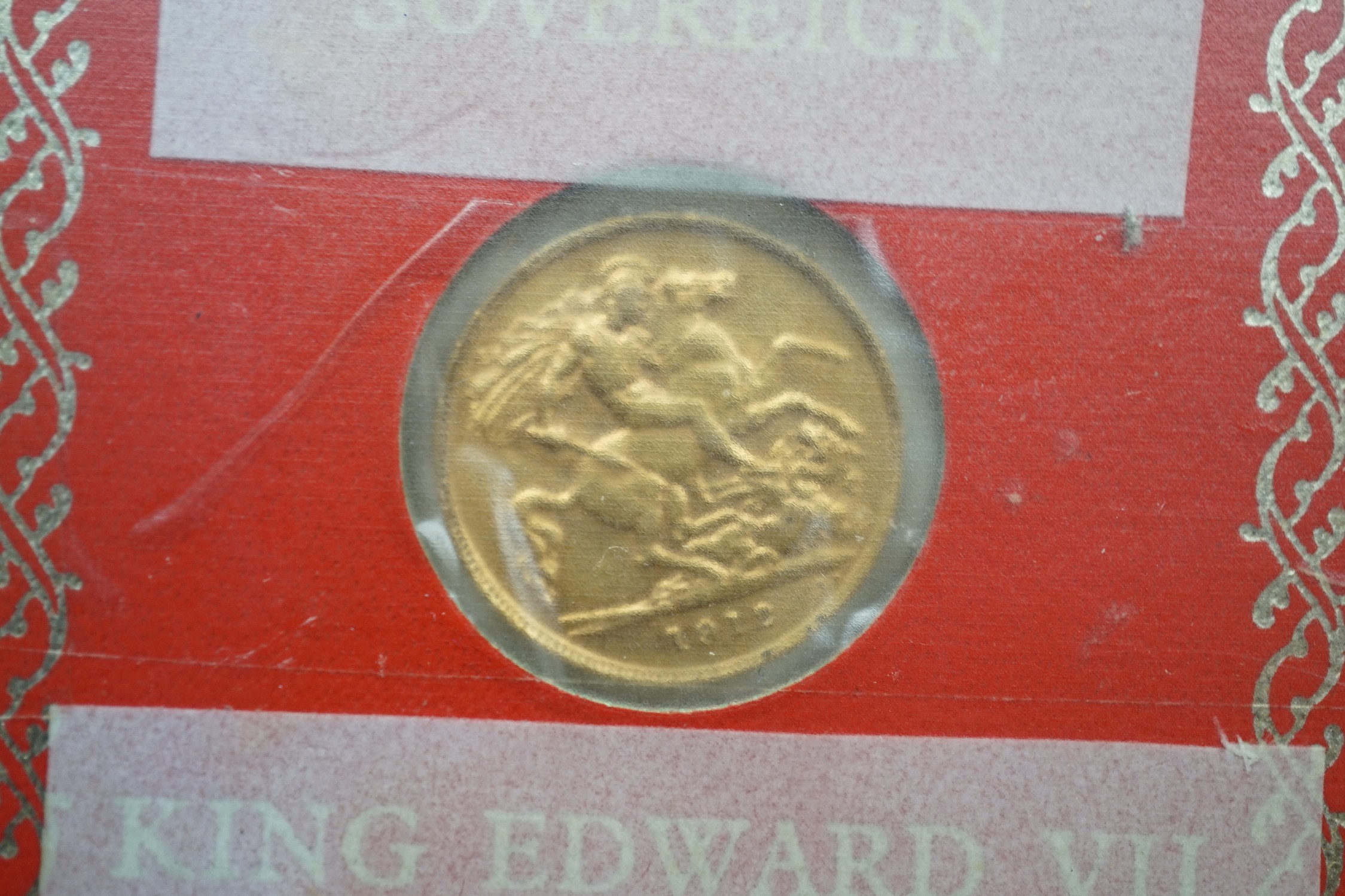 A George V 1912 gold half sovereign.